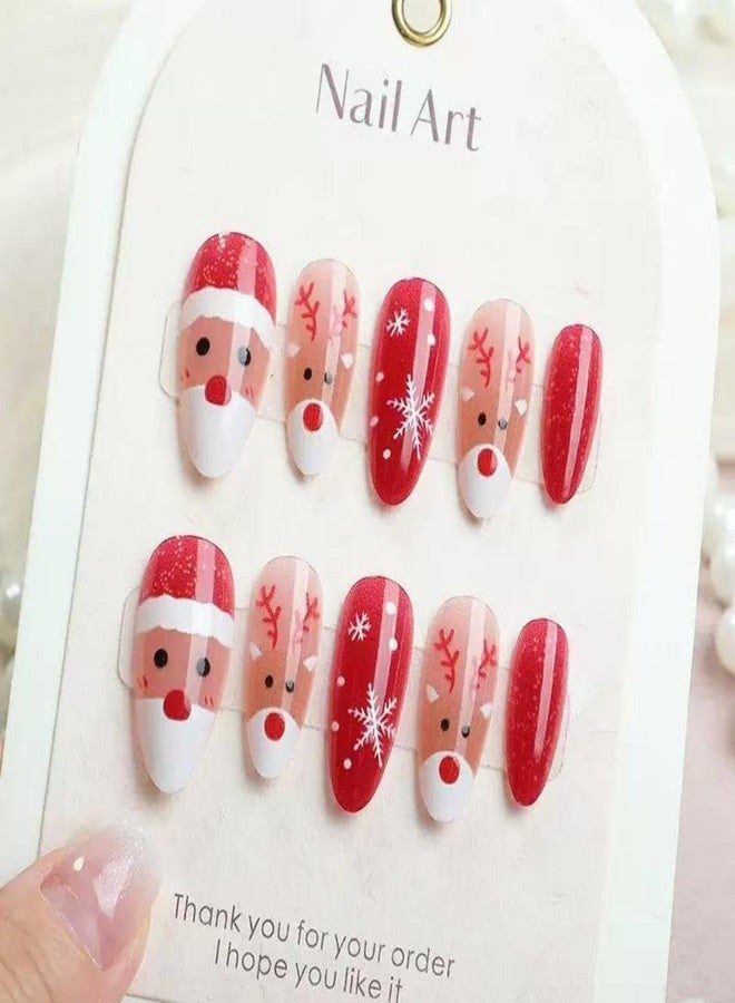 Sevgob 24Pcs Christmas Press on Nails Red Cat Eye Medium Almond Fake Nails with Santa Claus Design Elk Glue on Nail Snowflakes False Nail Press ons Reusable Christmas Nails for Women Girls Manicure - Image 2